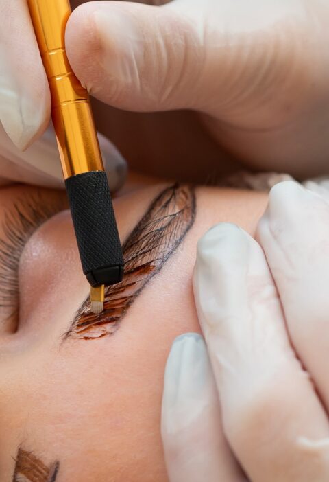 young-woman-going-through-microblading-procedure young-woman-going-through-microblading-procedure